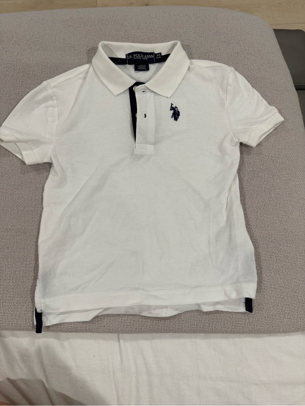 White Polo with Navy Logo and Trim